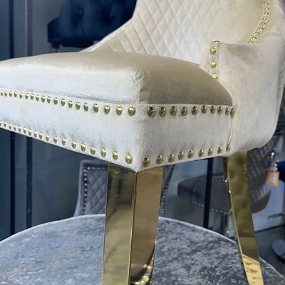 Louis Pandora Gold Marble Dining Table With Victoria Shimmer Velvet Lion Knocker Velvet Chairs
