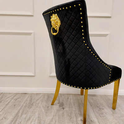 Louis Gold Marble Dining Table With Gold Quilted Lion Knocker Velvet Chairs