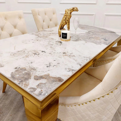 Louis Gold Marble Dining Table With Shimmer Cream Gold Lion Knocker Dining Chairs