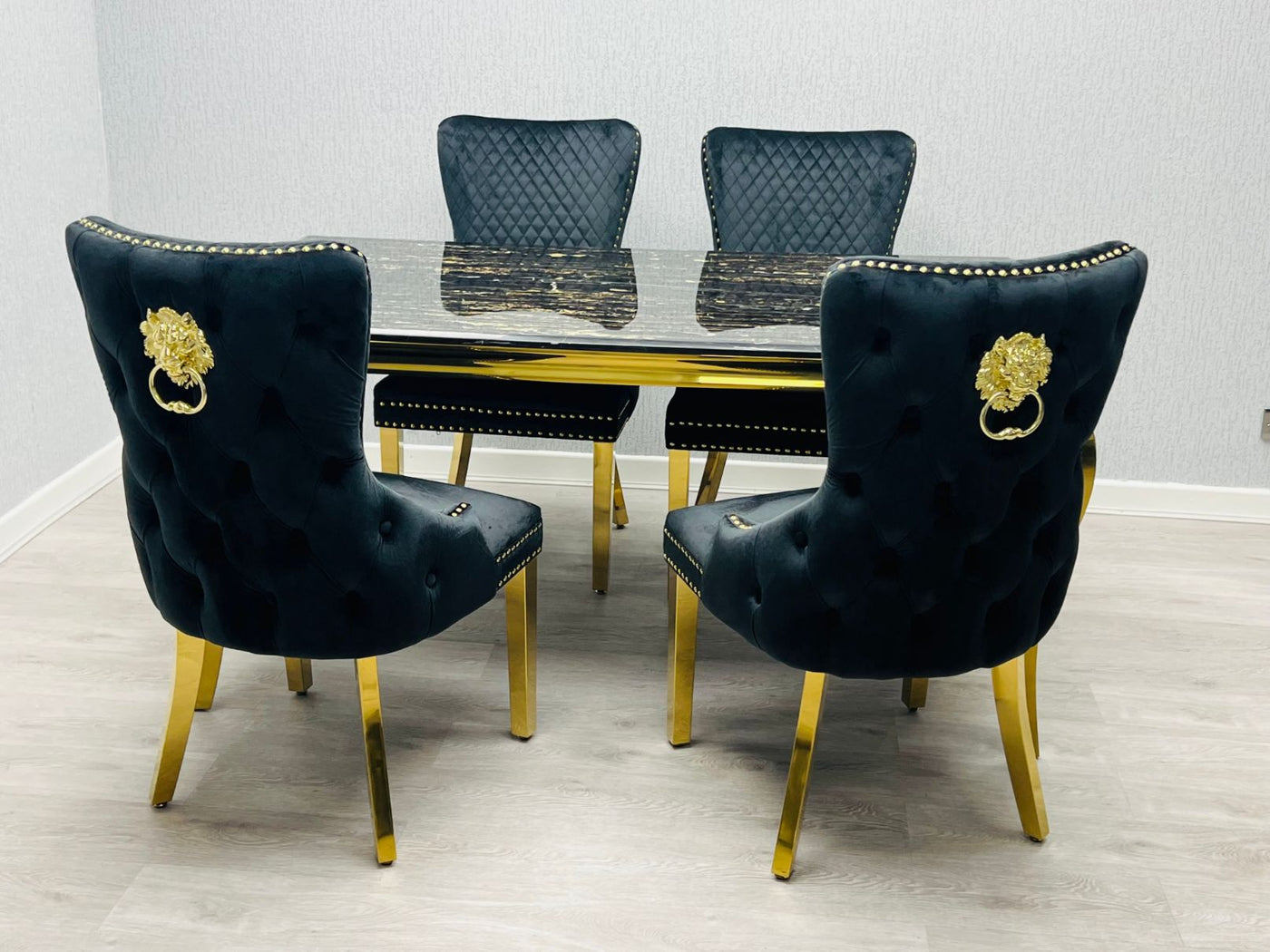 Louis Gold Black Marble Dining Table With Shimmer Black / Gold Lion Knocker Dining Chairs