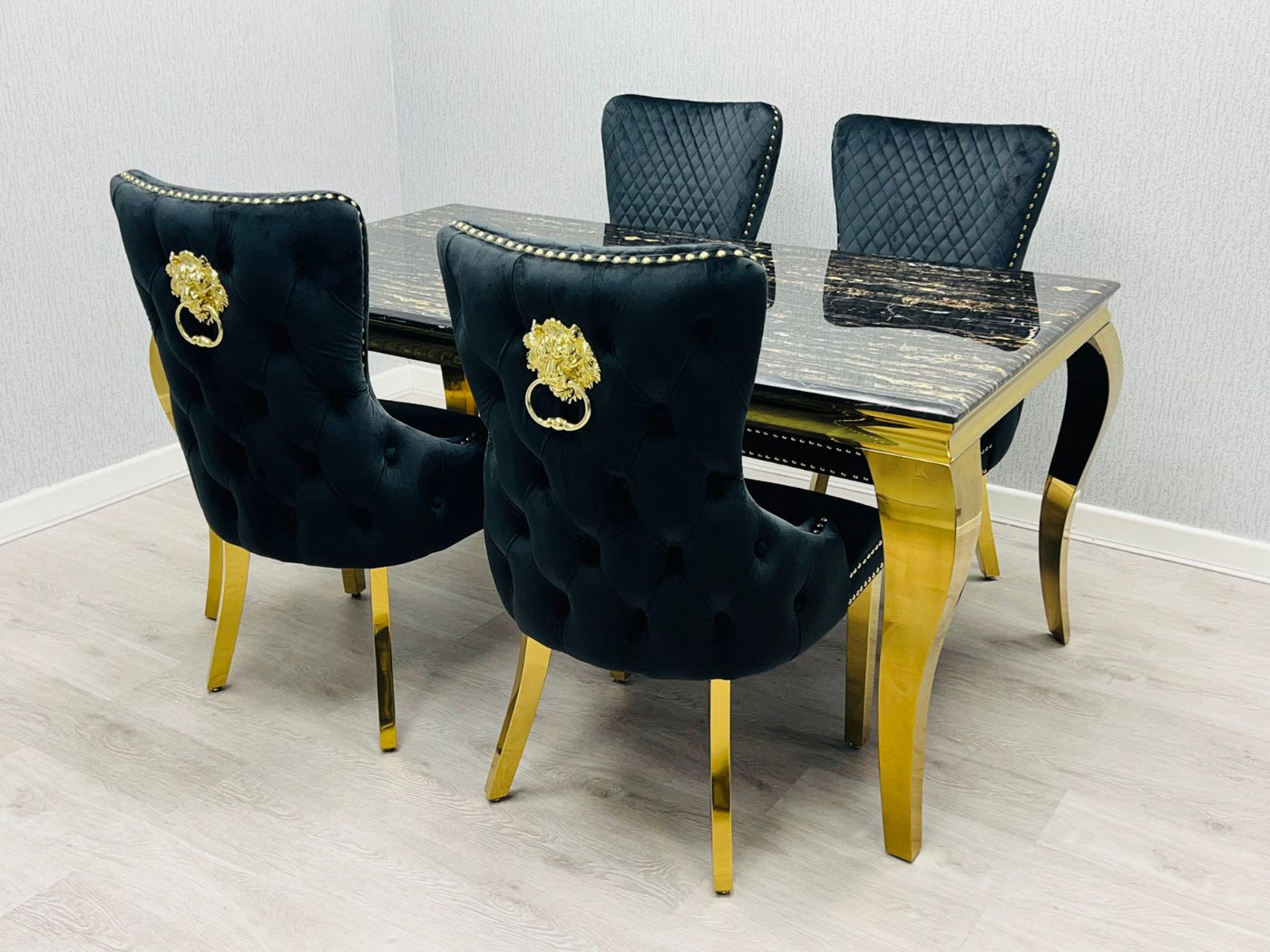 Louis Gold Black Marble Dining Table With Shimmer Black / Gold Lion Knocker Dining Chairs